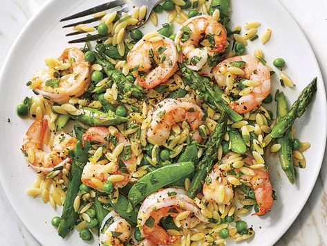 This simple shrimp and orzo salad is tossed with seasonal veggies and a bright, tangy dressing. Delicious at room temperature or chilled, it also makes a tasty lunch the next day if you have leftovers. You’ll need three cups of vegetables for this dish, but you can adjust the amounts of asparagus, sugar snap peas, and English peas. Shrimp Orzo Recipes, Orzo Salad With Shrimp, Shrimp Orzo, Salad With Shrimp, Orzo Recipes, Chicken Orzo Soup, Orzo Salad, Vinaigrette Recipes, Shrimp Salad