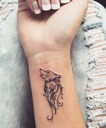 These stunning designs prove you can wear more than your heart on your sleeve Wolf Tattoos For Women, Small Wolf Tattoo, Cool Wrist Tattoos, Wolf Tattoo Design, Disney Tattoo, Small Wrist Tattoos, Wrist Tattoos For Women, Most Popular Tattoos, Wrist Tattoo