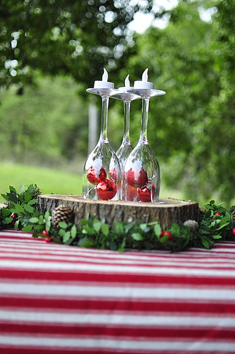 Christmas Picnic!   Outdoor Christmas Ideas - Plastic Wine Glass Centrepiece - beafunmum.com Christmas Picnic Table Decor, Christmas Picnic Ideas Outdoor, Christmas Picnic Ideas Table Settings, Christmas Picnic Ideas, Christmas Picnic, Kersfees Idees, Picnic Table Decor, Wine Glass Centerpieces, Glass Centrepiece