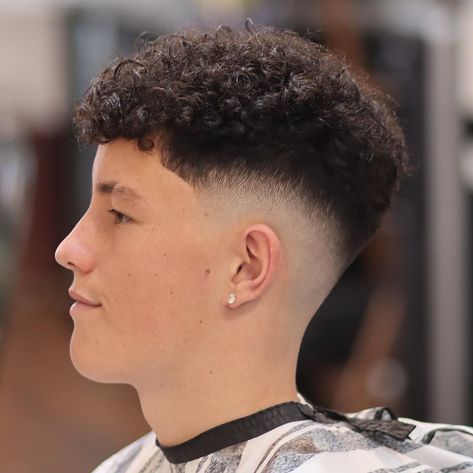 Check out these 36 taper fade haircuts that are all the rage. There are taper fades for all hair types and lengths, so you are bound to find one for you. Click the article link for more photos and inspiration like this // Photo Credit: Instagram @uptownbarbers.syd // #blowoutafrotaperfade #curlyloosetaperfade #dropfadetaperfade #menshair #menshaircuts #taperfade #taperfadeafrowithtwist #taperfadehair Curly Hair Styles For Men, Low Taper Fade Curly Hair, Bald Taper Fade, Fade Curly Hair, Low Fade Curly Hair, Curly Taper Fade, Taper Fade Haircuts, Undercut Curly Hair, Hair Styles For Men