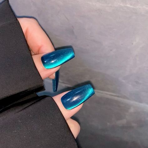 These ocean blue nails shimmer like deep-sea gems! 💎💅 With gemstone accents, every gesture is steeped in luxurious charm. #presson #pressons #pressonnail #pressonnails #falsenails #virtuvogue #virtuvoguenails #bluenails #gemnails #ballerinanails #coffinnails #longnails #cateyenails Ocean Blue Nails, Nails Shimmer, Vogue Nails, Sea Nails, Nail Shimmer, Cat Eye Nails, Ballerina Nails, Gem Nails, Ocean Blue