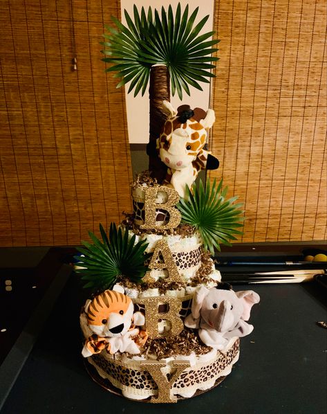 Safari Theme Diaper Cake, Jungle Theme Centerpieces Diy, Safari Diaper Cake Boy, Safari Jungle Baby Shower Ideas, Baby Shower Safari Theme Boy, Jungle Theme Baby Shower Ideas For Boys, Baby Safari Shower Ideas, Safari Centerpieces Baby Shower Ideas, Animal Themed Baby Shower Ideas