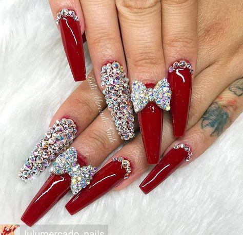 #nailart #nails #art #nailenthusiast #nailinspiration #nailgoals #coffinnails #red #rednails #longnails #swarovkicrystals #bows Nails With Crown Rhinestone, Red Glam Nails, Red Rhinestone Nails, Red Nails With Rhinestones, Ongles Bling Bling, Long Red Nails, Nails With Rhinestones, Red Acrylic Nails, Nails Design With Rhinestones