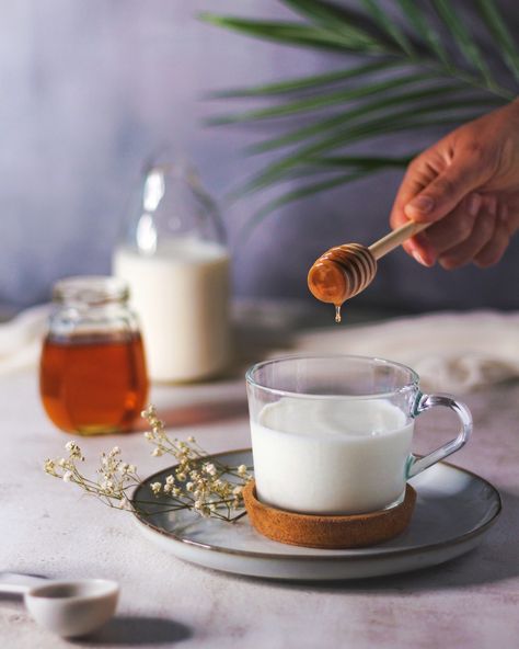 Pouring honey drops in a cup of milk Milk And Honey Aesthetic, Honey Pouring, Honey Shoot, Milk With Honey, Almond Milk Brands, Milk Pouring, Product Videography, Milk Photography, Bike Cakes