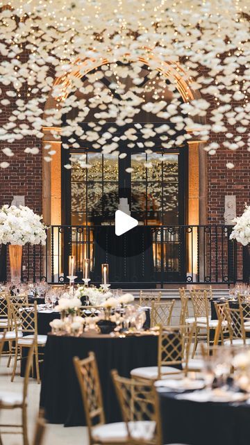 Wedding & Event Florist | Dayton•Cincinnati•OH•KY on Instagram: "Ceiling installations take some practice and years of experimenting.

Here’s how we did it…

▫️We had this structure custom built and installed with rigging by a professional event decorator. 

▫️We use clear fishing line and tiny metal fishing hooks to attach each rose. That meant tying 2,500 knots. 

▫️We pre-tied them in our shop (2 days) and boxed them up for transport so then we only had to hang them on-site (2 days).

▫️With an all black and white wedding with minimal greenery we used foam rose heads to minimize green.

▫️White silk hydrangeas helped hide mechanics and battery operated fairy lights were added for dimension at night.

▫️Comment 🌹Roses🌹 to get the link to the ones we used.

Planning: @blush_and_bloom_we Ceiling Installation Wedding, Silk Hydrangeas, Fishing Hooks, Professional Event, Foam Roses, Ceiling Installation, Black And White Wedding, We Did It, Event Themes