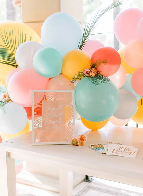 A Colorful Tropical Gender Reveal - Inspired By This Flower Themed Gender Reveal, Gender Reveal Tropical Theme, Gender Reveal Summer Theme, Summertime Gender Reveal Ideas, Tropical Gender Reveal Party, Summer Theme Gender Reveal, Pool Party Gender Reveal Ideas, Fruit Gender Reveal, Gender Reveal Colors Ideas