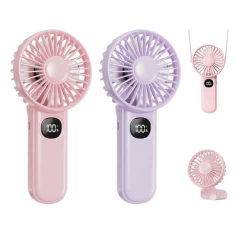 PRICES MAY VARY. 【5-speed Adjustable & Ultra-quiet Handheld Fan】The Xigmer F11 mini handheld fan with 5 adjustable gears, wind speed up to 2.5-4.6m/s, the revolutions per minute up to 2600-4500,the noise is 20-40db, ultra-quiet,Powerful and easy to use.Even the slowest level can help cool you down. 【Unique Design mini Fan】Our small fan rotates at a 180-degree angle, and can be used hand-held when traveling outdoors or hung around the neck with a string; when used at home or in the office, it can Handheld Fan, Personal Fan, Wind Speed, Hand Fans, Small Fan, Mini Fan, Hand Held Fan, Office Travel, Night Lights