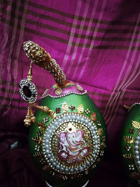 Kobbari bondam decoration for wedding#lord ganesha. Pelli Bondam Decoration, Kobbaribondam Decoration, Kobbari Bondam Decoration For Marriage, Kobbari Bondam Decoration, Pelli Decoration, Diy Engagement Decorations, Coconut Design, Wine Bottle Flowers, Decoration Things