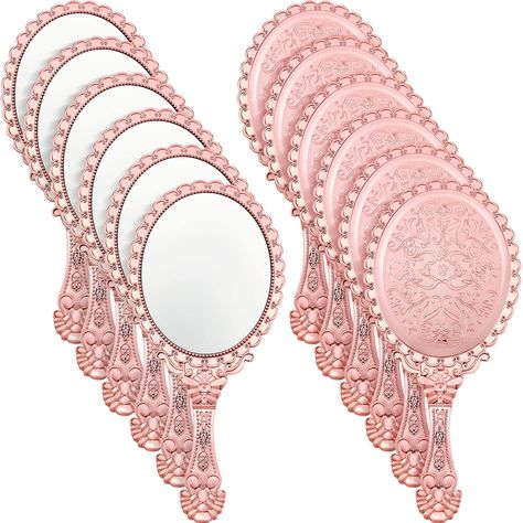 PRICES MAY VARY. What You Will Get: you will receive 12 pieces of rose gold vintage handheld mirrors, the sufficient quantity can meet your daily requirement, and you can also share extra mirror with your friends and families Embossed Flower Design: these hand held decorative mirrors are designed with comfortable handles for long time holding, these classic decorative mirrors are embossed with retro flowers to show elegance, oval shape and retro elements will gain most girls' favors Portable to Vintage Handheld Mirror, Bridgerton Party, Princess Mirror, Princess Party Favors, Princess Tea Party, Handheld Mirror, Travel Mirror, Mirror Makeup, Mirror Vanity