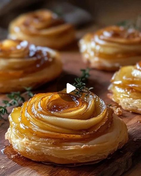 Franny on Instagram: "🍐 Pear & Brie Puff Pastry Roses with Honeyed Thyme Glaze  Delicate puff pastry roses filled with brie and caramelized pears, finished with a thyme-infused honey glaze for a sweet, floral touch.  Ingredients:  1 sheet puff pastry, thawed and cut into 6 strips 1 large pear, thinly sliced 120 g brie cheese, sliced 1 tbsp butter 1 tbsp brown sugar 2 tbsp honey 1 sprig fresh thyme Powdered sugar, for dusting (optional) Instructions:  Caramelize the Pears: In a skillet over medium heat, melt the butter and add the pear slices with brown sugar. Cook for 5-7 minutes, stirring occasionally, until the pears are soft and caramelized. Remove from heat and let cool.  Prepare the Pastry Roses: Preheat oven to 190°C (375°F). Place pear slices along the top half of each puff pastry Pear Puff Pastry Appetizer, Pear Puff Pastry Dessert, Puff Pastry Roses, Pear Puff Pastry, Pear Brie, Caramelized Pears, Pear And Almond Tart, Honey Puffs, Pear And Almond Cake