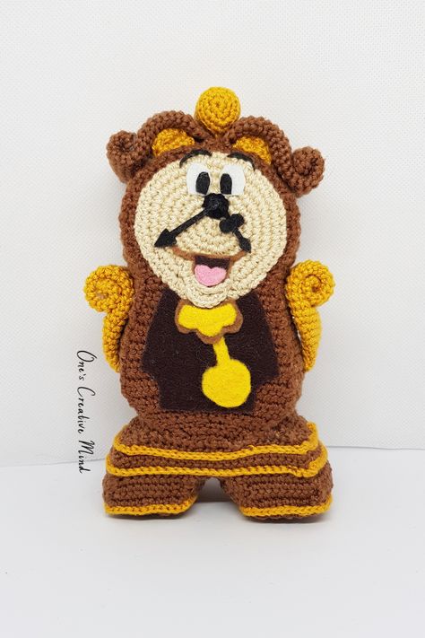 Check out my Cogsworth crochet pattern with step-by-step instructions. Perfect for those of you that love Disney inspired amigurumi. The FREE video tutorial is available on my YouTube channel. The written pattern is Patreon only content so you will have to sign up to my Patreon to access it. With a midi tier subscription of £5 per month (that you can cancel at anytime) you will gain access to ALL of my Patreon patterns. Disney Christmas Crochet, Crochet Disney Patterns Free, Free Disney Crochet Patterns, Crochet Disney Characters, Disney Crochet Patterns Free, Beauty And The Beast Crochet, Crochet Patterns Disney, Cogsworth Beauty And The Beast, Kpop Crochet