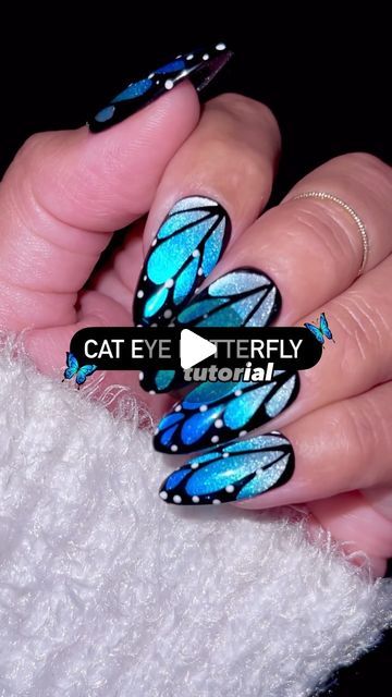 Jeanette Flores on Instagram: "POV: You found the PERFECT tutorial for spring nails!!😱🤩🤯 Trending butterfly wings, but make them cat eye🦋  Make sure to SAVE & SHARE for spring nail inspo, and FOLLOW for more tutorials 💅🏽   Using @daily_charme (code: JEN10) •C02 Whiskers •Strong Cat Eye Magnetic Cylinder •T09 Blue Lagoon •05 Blending nail art brush  •Charme Gel Art Paint / P01 Black •Daily Charme Nail Art Brush / Art Liner  #dailycharme #chromenails #uñas #springnails2024 #springnails #butterflywings #butterflynails #sparklynails #glitternails #nailinspo #ombrenails  #iridescentnails #fairynails #fairycore #nailart #cutenails #diynails #nailtrends #viralnails #howto #nailarttutorial #tutorial #diynails #easynailart #stepbystep #cateyenails #magneticnails #bluemorpho" Black And Blue Cat Eye Nails, Butterfly Cat Eye Nails, 2024 Nail Art Trends, Cat Eye Butterfly Nails, Nail Art Designs Butterfly, Chrome Butterfly Nails, Brush Nail Art Design, Nails Design Butterfly, Butterfly Wing Nails