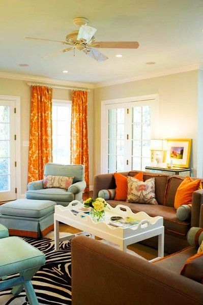 Love the orange curtains and brown couch! decorating-ideas Blue And Orange Living Room, Nola House, Panama Beach, Simply Orange, Room Retro, Orange Curtains, Upholstery Ideas, Dopamine Decor, Living Room Orange