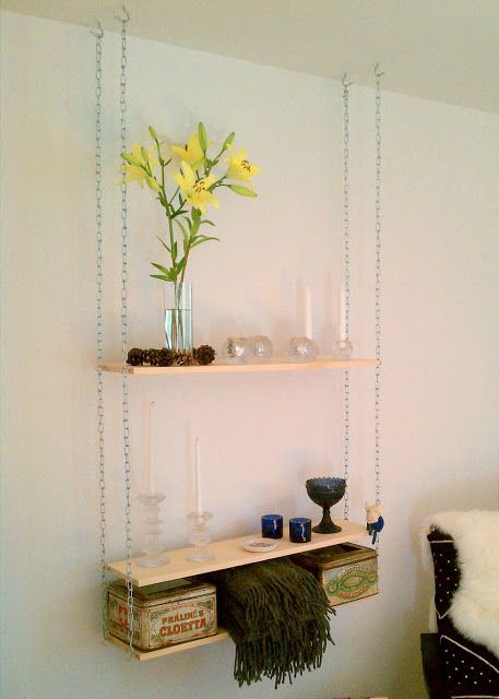 use more "refined" materials to create a hanging shelf under cabinets...Hang ‘em up! | IKEA Hackers Clever ideas and hacks for your IKEA Ikea Items, Hanging Bookshelves, Ceiling Shelves, Diy Hanging Shelves, Ikea Bookshelves, Diy Wall Shelves, Ikea Hackers, Decorating Shelves, Ikea Diy