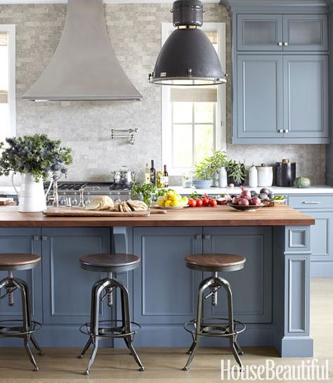 beautiful masculine kitchen by Parrish Chilcoat & Joe Lucas featured in House Beautiful.  Love the two tones of gray from Farrow & Ball's Down Pipe, to Benjamin Moore's Chelsea gray on the island.  The vintage stools, industrial pendant fixture, and the acid washed seagrass limestone backsplash are simply gorgeous! Blue Gray Kitchen Cabinets, Grey Blue Kitchen, Серая Кухня, Interior Dapur, Blue Kitchen Cabinets, Herringbone Backsplash, Kabinet Dapur, Blue Cabinets, Classic Kitchen