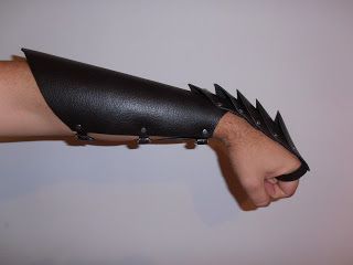 Leather gauntlet/bracer combo | LARP tutorials Bracers Diy, Character Accessories, Costume Concept, Leather Gauntlet, Medieval Games, Dragon Riders, Leather Bracers, Dragon Costume, Craft Foam