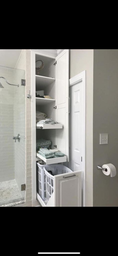 Hidden Laundry In Bathroom Small Spaces, Small Laundry Built In Cabinets, Bathroom Laundry Cabinet Storage Ideas, Storage Next To Bathtub, Cupboards In Bathroom, Pull Out Shelves Bathroom, Bathroom Pull Out Storage, Hidden Hamper In Bathroom, Hidden Laundry Hamper Bathroom