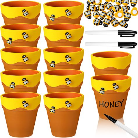 PRICES MAY VARY. Unleash Your Creativity with DIY Set: the package includes 12 terracotta honey bee pots, 24 bee decorations, and 2 markers in black, ideal for DIY some gift, bringing out your artistic side to create unique vibrant displays, adding fun to your bee party, birthday parties, baby showers Ideal Decorations for Special Events: the terracotta pots can be applied to a bee themed party or other special event; They are designed with irregular yellow edges, it looks like honey overflows; Bee Gifts Diy, Bee 3rd Birthday Party, Bee Shower Ideas, Bee Centerpiece Ideas, Bumble Bee Baby Shower Ideas, Tearoom Ideas, Bees Diy, Bee Pot, Bee Birthday Theme