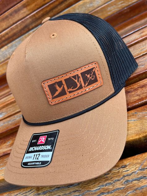 These leather patch Richardson 112FPR Rope hats are a great way to flaunt your style and look sleek at the same time. Patches made from 100% leather and engraved with a crisp design and hand stitched on our most popular style of hat. Your friends are going to be jealous! Multiple hat colors available, Bulk pricing available (see below) custom shape patches available upon request. SIZE OF PATCH HEIGHT WILL VARY DEPENDING ON CUSTOMER LOGO If a hat color is not listed please message us and we can o Hat Patches Design, Leather Hat Patch Ideas, Leather Patch Hats, Leather Patch Hat Ideas, Hat Patch Ideas, Trucker Hats With Patches, Rope Hats, Western Hat Styles, Leather Hat Patch