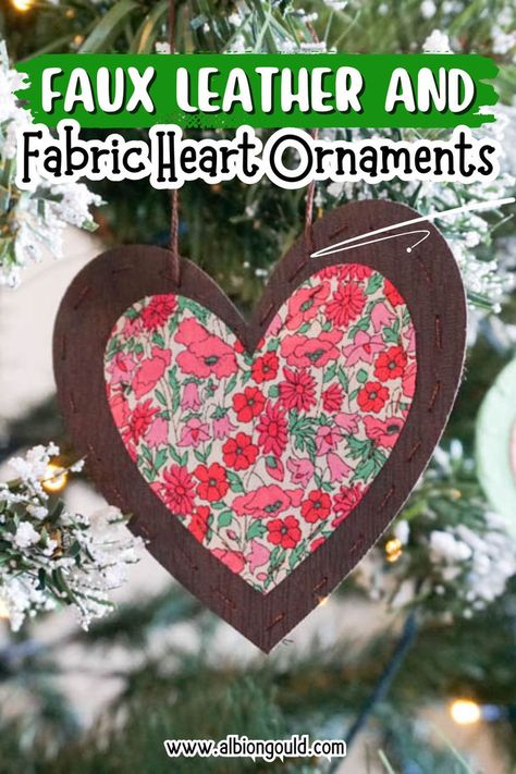 Learn how to make faux leather and fabric heart ornaments with this simple DIY project. Perfect for adding a personal touch to your holiday decor, these handmade heart ornaments are ideal for Christmas crafts and home decoration. Add charm with fabric and faux leather. Heart Ornaments Diy, Fabric Heart Ornaments, Liberty Of London Fabric, Handmade Christmas Tree, Fabric Heart, Handmade Heart, Fabric Ornaments, Heart Ornament, Simple Diy