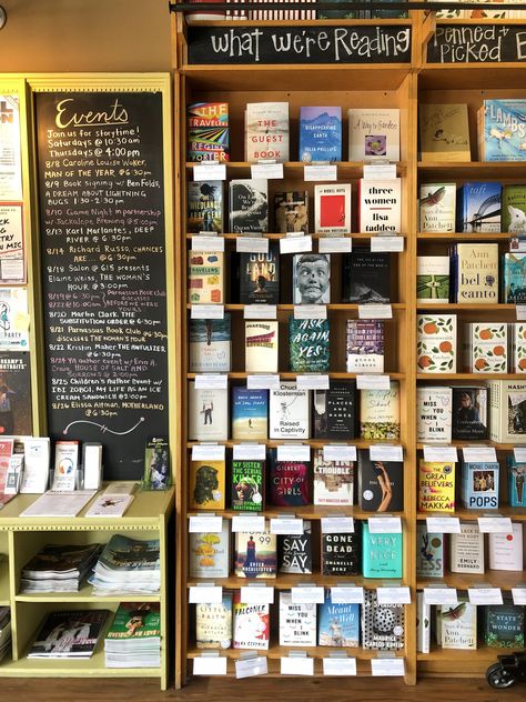 The first rack of books upon entering Parnassus is the staff recommendations section. CREDIT RACHEL IACOVONE / WPLN Bookstore Checkout Counter, Coffee Shop Book Store Aesthetic, Bookstore Wine Bar, Small Book Store Aesthetic, Bookstore Coffee Shop Aesthetic, Coffee Shop Bookstore Aesthetic, Bookstore Event Ideas, Bookstore Cafe Ideas, Small Bookstore Design