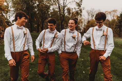 Men’s Suspenders Wedding, Brown Pants And Suspenders Wedding, Rust Wedding Groom Attire, Groomsman Fall Wedding, Groomsman Suspenders And Bowties, Groomsmen Attire Brown Pants, Terracotta Suspenders Groomsmen, Copper Suspenders, Burnt Orange Bow Tie And Suspenders