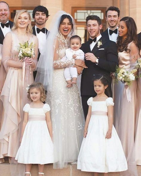 Cute Priyanka Chopra with Nick Jonas on their Christain wedding with their friends. See more on wedmegood.com  #wedmegood #indianwedding #indianbride #priyankachopra #priyanka #nickjonas #veil #christianwedding #christianweddingideas #gowns #dresses #white Priyanka Chopra Wedding, Celebrity Wedding Photos, Bollywood Wedding, Christian Wedding, Nick Jonas, Jonas Brothers, Priyanka Chopra, Bollywood Celebrities, Indian Bride