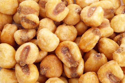 Contrary to their name, corn nuts are not nuts, but they're just as satisfying as a crunchy snack. They're made by deep frying [corn](http://www.leaf.tv/videos/grilled-corn-crostinis-2014/) kernels until they're hard and brittle, and then seasoning them. Look for dried white corn ... Homemade Corn Nuts, Corn Nuts Recipe, Corn Nut, How To Make Corn, Trip Snacks, Corn Snacks, Healthy Nuts, Dried Corn, After School Snack