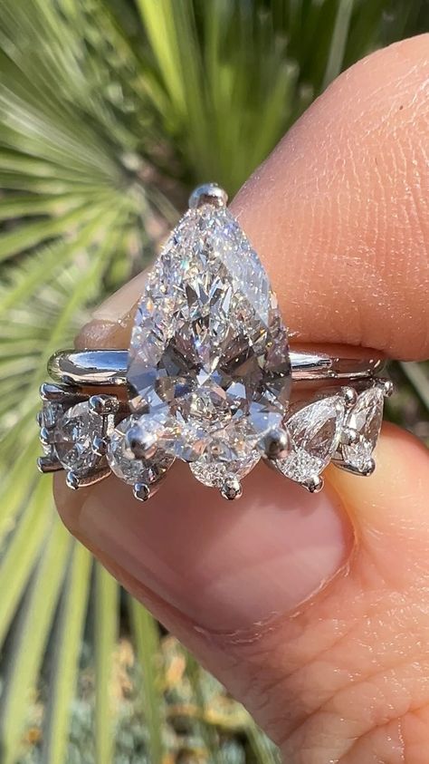 Pairing perfection 🍐 Elevate your love story with our stunning Solitaire Pear Diamond Engagement Ring, beautifully styled with our pear… | Instagram Pear Shaped Diamond Wedding Ring, Pear Engagement Ring Wedding Band, Pear Shape Ring With Band Wedding Set, Pear Diamond Ring Stack, Pear Solitaire Engagement Ring With Band, 5 Carat Pear Engagement Ring, Pear Engagement Ring Stack, Pear Engagement Ring With Wedding Band, Pear Rings