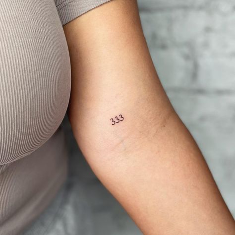 The number 333 is packed with meaning, often linked to spiritual awakening and protection. Many see it as a sign from guardian angels, reminding them ... Fine Line Angel Number Tattoo, 333 Tattoos, 333 Angel Number Tattoo, 333 Tattoo Ideas, 333 Tattoo, 444 Tattoo, Barcode Tattoo, Number 333, Octopus Tattoos