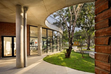 EuroSchool Bannerghatta in Bengaluru shows that design and nature are interconnected | Architectural Digest India Nature School Architecture, Laboratory Building, Sustainable Schools, Interior Design Help, Sowing Seeds, Nature School, Green School, Residential Schools, India School