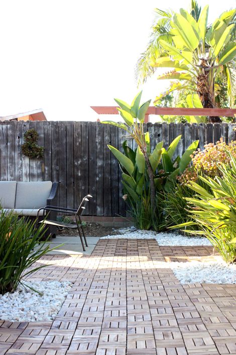 backyard patio with ikea PLATTA decking Deck Tiles Over Gravel, Ikea Patio Tiles, Ikea Decking Tiles, Ikea Decking, Ikea Deck Tiles, Ikea Deck, Outdoor Checkers, Wood Tile Flooring, Ikea Garden