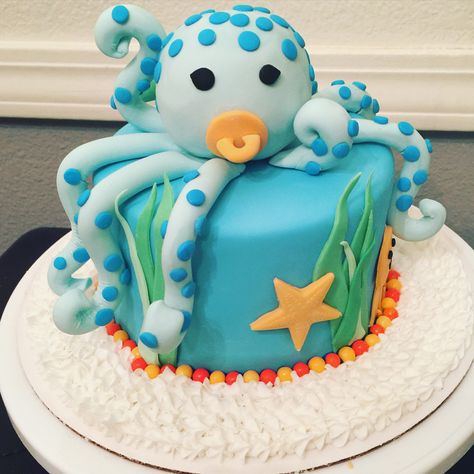 It's a boy, baby octopus baby shower cake Octopus Baby Shower Ideas, Ocean Baby Shower Cake, Baby Shower Fishing Theme, Baby Shower Theme Cake, Ocean Baby Shower Theme, Fishing Baby Shower Theme, Hawaiian Baby Showers, Baby Shower Fishing, Turtle Baby Shower