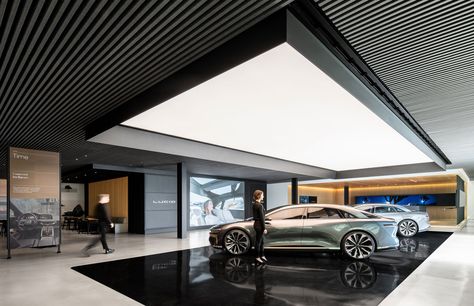 Luxury Car Showroom, Car Dp, Parking Lighting, Car Garage Design, Car Showroom Architecture, Auditorium Plan, Car Architecture, Lucid Motors, Car Showroom Design