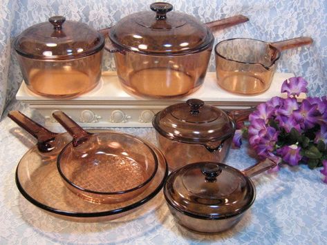 Vintage Corning Ware Pyrex Brown or Amber Visions Glass Cookware Set, Saucepans and Skillets in an Extra Large 11 Piece Custom Set. This line is also known as Visionware. The Visions line is glass made by Corning was made in the USA or France, it was made in from 1982 to 1993 and has been discontinued. Earlier pieces were made in France, production was later moved to the USA. Go Green with this set, glass is safe for cooking, no health worries and since glass heats more quickly you can cook at a Glass Cookware, Vintage Cookware, Saucepans, Vintage Memory, Cookware Sets, Cool Kitchen Gadgets, Good Ole, Cooking Pot, Cookware Set