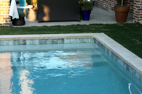 Water Line Pool Tile | the spillway. it makes a soothing, bubbling sound that doesn't drown ... White Waterline, Waterline Tile, Waterline Pool Tile, Pool Tile Designs, Swimming Pool Liners, Stone Pool, Pool Finishes, Swimming Pool Tiles, Pool Renovation