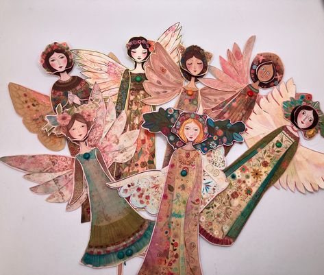 7 angel DIY articulated paper art dolls with whimsical details and beautiful wings. This set is best printed on cardstock and you will need mini brads and glue to assemble them.  Your download includes 1 PDF file with 6 pages, which includes terms of service page and directions for assembly. No watermarks will appear on your download.  This download is a DIY print, cut and assemble project at an intermediate skill level. Although detailed directions are included, some paper craft experience is h