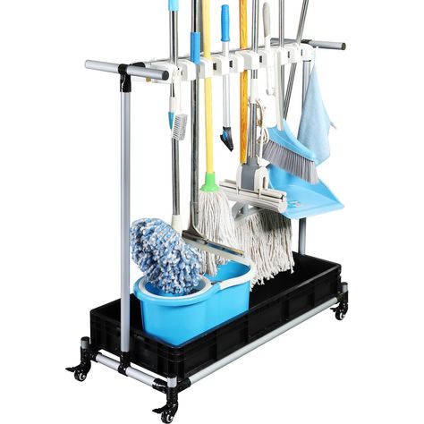 PRICES MAY VARY. 1、Powerful Storage Capacity: The broom and mop caddy can hold up to 16 different-sized and different-material long-handled tools, while the 20 foldable hooks provide additional storage for smaller items. The base sink is spacious enough to accommodate large cleaning tools like buckets. 2、Agile and Easy to Maneuver: This cleaning cart is designed for effortless transportation of cleaning tools, saving your energy and enhancing cleaning efficiency. Equipped with four silent wheels Best Cleaning Tools, Cleaning Cart, Mop Holder, Broom Holder, Mops And Brooms, Utility Cart, Household Cleaning Tips, Household Cleaning Supplies, Diy Cleaning Products