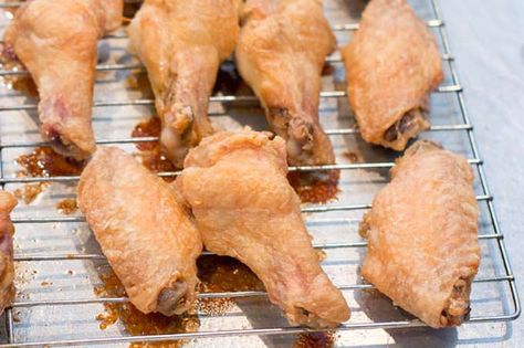 Toss out that deep fryer just like last year's jeans. We've got the solution to crispy baked chicken wings. Pesto Calzone, Chicken Wing Sauce Recipes, Sticky Chicken Wings, Baked Chicken Wings Oven, Crispy Baked Chicken Wings, Crispy Oven Baked Chicken, Chicken Wing Recipes Baked, Wing Sauce Recipes, Baked Wings