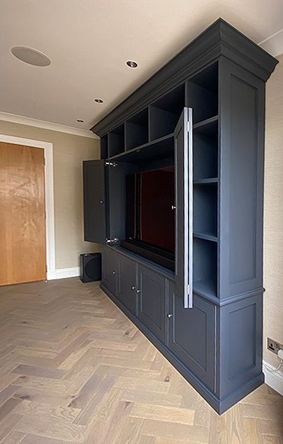 TV wall unit with doors to hide TV Media Cabinet With Doors, Built In Tv Wall Unit Hide Tv, Bifold Tv Cabinet Doors, Hidden Tv Media Wall, Built In Hidden Tv Wall Unit, Hidden Tv In Cabinet, Kitchen Tv Unit, Built In Tv Cabinet With Doors, Hidden Tv Bookshelf