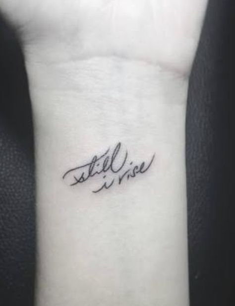 Watercolor Wrist Tattoo, I Rise Tattoo, Divorce Tattoo, Still I Rise Tattoo, Rise Tattoo, Henne Tattoo, Still I Rise, Small Wrist Tattoos, Modern Tattoos