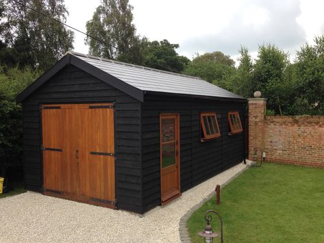 Wooden Garages www.quick-garden.co.uk/wooden-garages-aluminum-carports.html External Garage Ideas, Wooden Garage Ideas, Wooden Garden Shed, Black Shed With Wood Trim, Woodshop Exterior, Black Shed Ideas, Workshop Exterior, Garage Outside, Wooden Garages