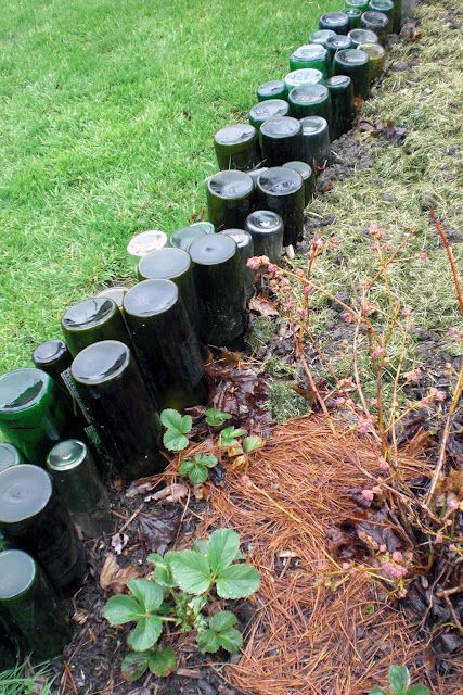 Bottle border, so much better looking than a single row Wine Bottle Garden, Bottle Trees, Garden Totems, Bottle Garden, Lawn Edging, Fine Gardening, Beer Bottles, Garden Yard Ideas, Garden Edging