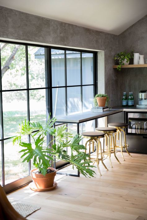 Oversized windows flooded this space with natural light and became one of my favorite design features in this house.