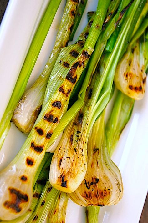 Grilled scallions are incredibly delicious and the perfect summer side dish. It's so easy to add a handful to the grill while the main course is cooking, and they only take a couple of minutes! #onions #scallions #grilling #grilledonions #grilledscallions #grilledveggies #summergrilling Green Onion Recipes, Summer Dinner Recipes Grill, Lobster Stew, Green Onions Recipes, Scallions Recipes, Weekend Recipes, Summer Side Dish, Grilled Onions, Summer Side Dishes