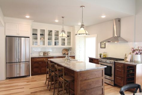 Love the wood base cabinets with white uppers. A very unique look! Photos | Fixer to Fabulous | HGTV Dark Stained Cabinets, Laundry Reno, Fixer To Fabulous, Hgtv Dream Home, All White Kitchen, Cabinet Ideas, Open Living Room, Dark Cabinets, Transitional Kitchen