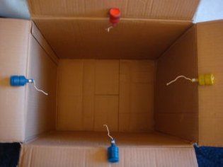 Picture of Glueing the Poppers to the Box Funny Gift Wrapping Ideas, Christmas Gift Pranks, Funny Gift Wrapping, Prank Box, Christmas Pranks, Prank Gift Boxes, Exploding Gift Box, Funny Boyfriend Gifts, Prank Gifts