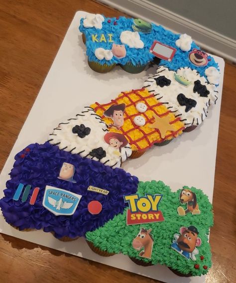 Toy Story Cake With Cupcakes, Pull Apart Cupcake Cake Toy Story, 2 Infinity And Beyond Cupcakes, 2 Infinity And Beyond Birthday Cupcakes, Toy Story Cupcake Ideas 2nd Birthday, Toy Story 3 Birthday Cake, 2 Infinity And Beyond Birthday Party Cake, Toy Story Themed Cupcakes, Toy Story 2 Cake