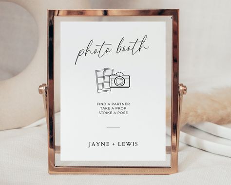 Create lasting memories with our Photo Booth Sign Template. This DIY printable sign adds a touch of modern elegance to your wedding reception. Guide your guests to the fun and capture precious moments with this minimalist signage. * Access your template instantly. * Customize easily with Canva, a free browser program. * Edit wording, colors, and layout with just a few clicks. * Print at home or choose professional printing. YOU'LL RECEIVE ------------------------------------------- ✓ 5 x 7 inch editable Canva template. ✓ 8 x 10 inch editable Canva template. ✓ Instruction guides for printing and editing. LET US EDIT FOR YOU ------------------------------------------- We can personalize and edit your template for you! Click here to find out more & add this to your order: https://etsy.me/3Qtq Photo Booth Signs Wedding, Photo Booth Station, Camera Wedding, Wedding Reception Signage, Polaroid Wedding, Photo Guest Book Wedding, Instax Mini 9, Reception Signage, Photo Booth Sign