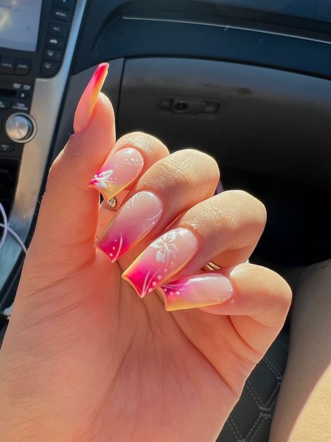 yellow french with airbrushed pink and white flowers 🤍 Pink And Yellow Ombre Nails Acrylic, Orange And Pink Nail Designs Summer, Pink And Yellow Ombré Nails, Pink On Pink Ombre Nails, Pink White And Orange Nails, Yellow And Pink Ombre Nails, Summer Nails Colourful, Japanese Nail Art Summer, Pink And Yellow Summer Nails